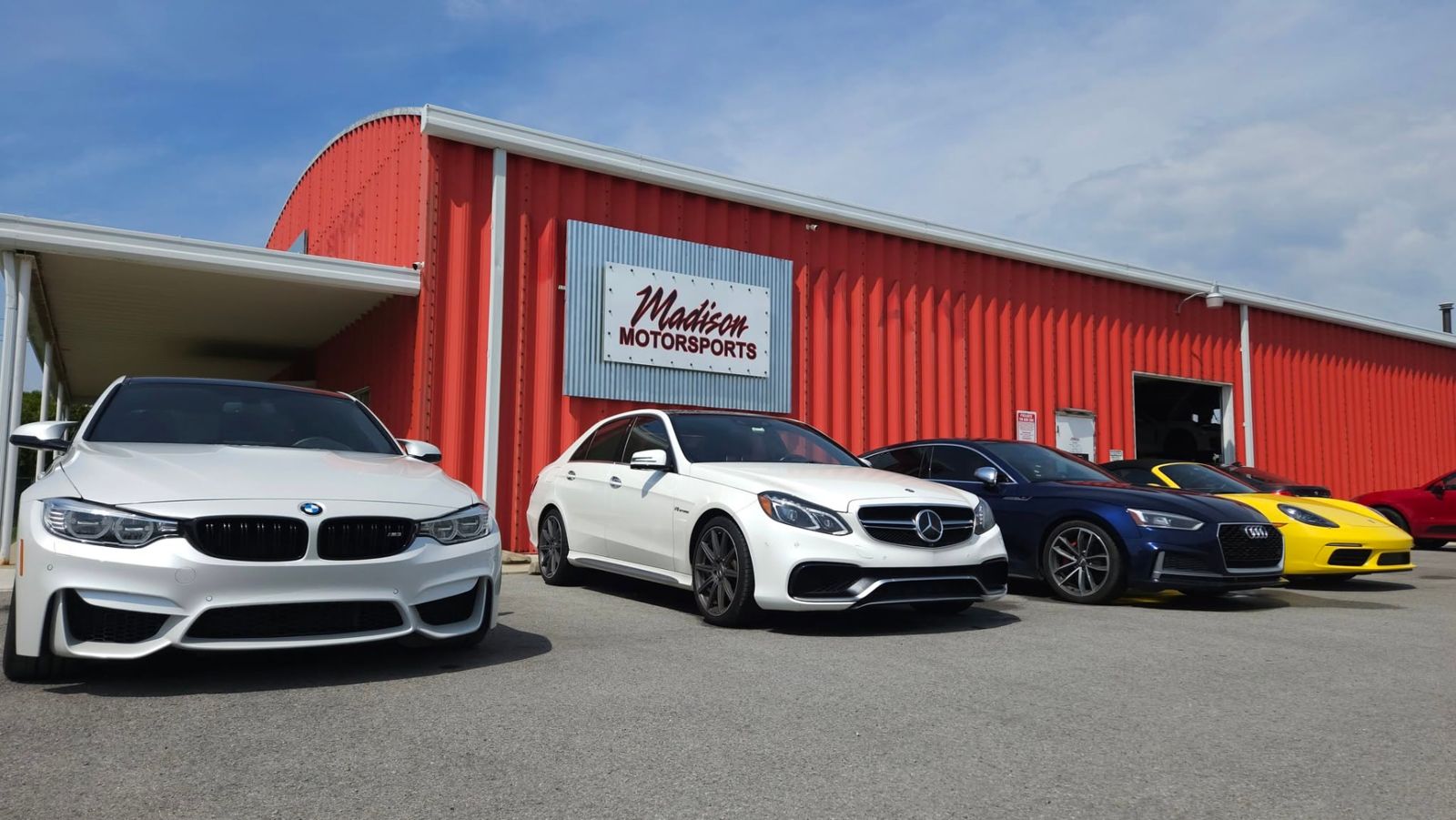 BMW M3, Mercedes E63 and Audi RS5 outside the Madison Motorsports building