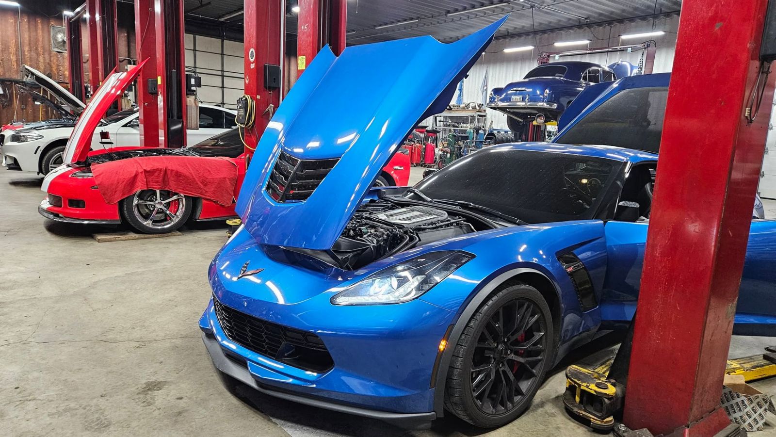 Blue Corvette Z06 in for service